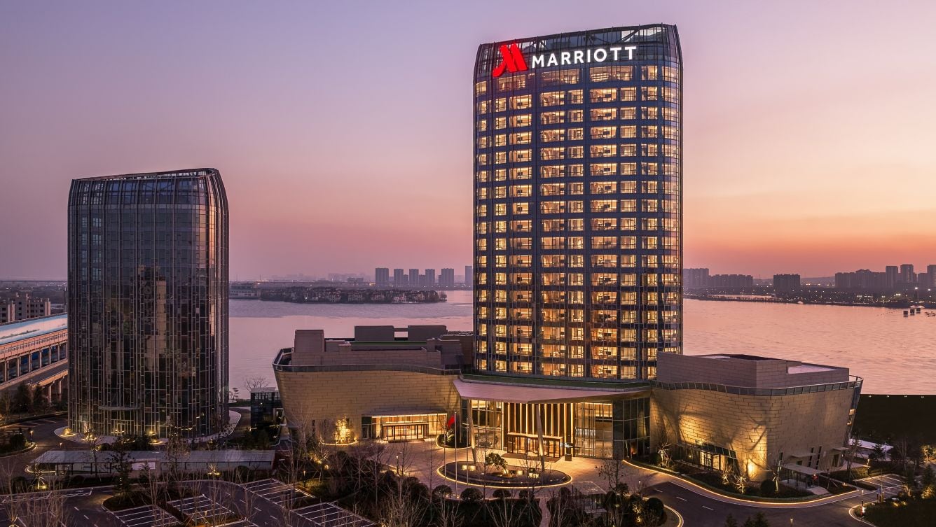 Completed Qingdao Marriott Hotel beside the waterfront at dusk